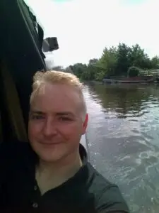 Man on a canal boat